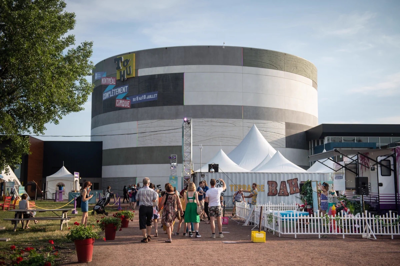 TOHU's circular venue in Montreal, with festival signage and visitors outside
